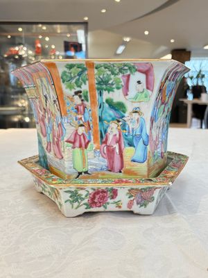 A Chinese Canton famille rose hexagonal planter and stand with narrative design — photo 1