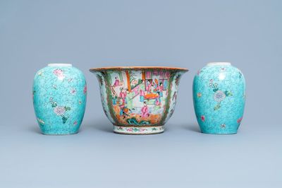A Chinese Canton famille rose jardinière and a pair of turquoise-ground jars, 19th C.
