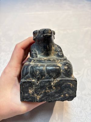 A Chinese carved black stone paper weight in the shape of a reclining buffalo on a lotus throne, Northern and Southern dynasties — photo 2