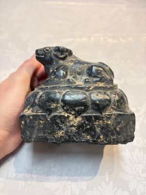 A Chinese carved black stone paper weight in the shape of a reclining buffalo on a lotus throne, Northern and Southern dynasties — photo 3