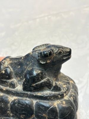 A Chinese carved black stone paper weight in the shape of a reclining buffalo on a lotus throne, Northern and Southern dynasties — photo 7