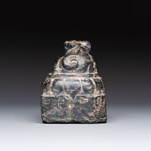 A Chinese carved black stone paper weight in the shape of a reclining buffalo on a lotus throne, Northern and Southern dynasties — photo 3