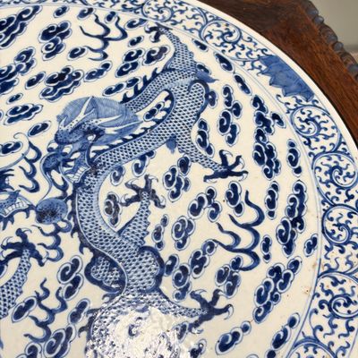 A Chinese carved hongmu table with a blue and white 'Dragons' plaque — photo 5