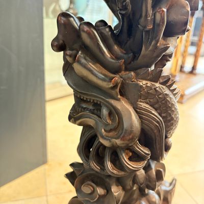A Chinese carved hongmu table with a blue and white 'Dragons' plaque — photo 13