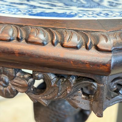 A Chinese carved hongmu table with a blue and white 'Dragons' plaque — photo 18