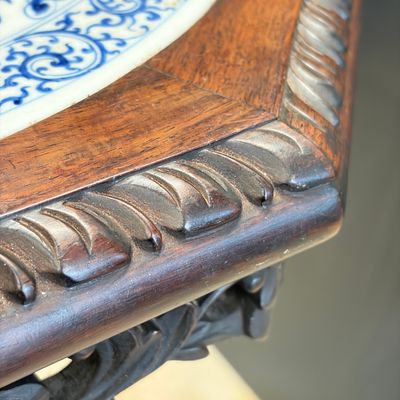 A Chinese carved hongmu table with a blue and white 'Dragons' plaque — photo 31