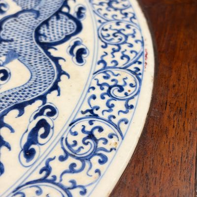 A Chinese carved hongmu table with a blue and white 'Dragons' plaque — photo 32