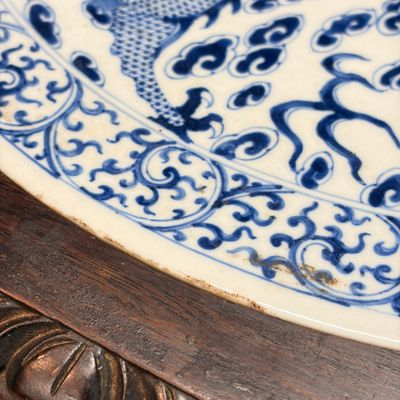 A Chinese carved hongmu table with a blue and white 'Dragons' plaque — photo 33