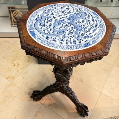 A Chinese carved hongmu table with a blue and white 'Dragons' plaque — photo 1