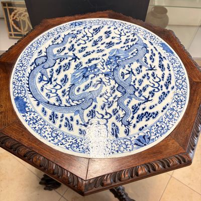 A Chinese carved hongmu table with a blue and white 'Dragons' plaque — photo 2