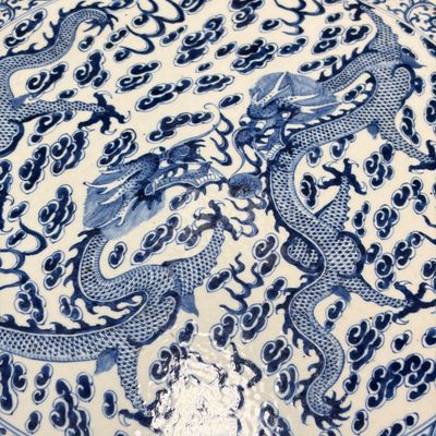 A Chinese carved hongmu table with a blue and white 'Dragons' plaque — photo 3