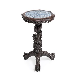 A Chinese carved hongmu table with a blue and white 'Dragons' plaque — photo 1