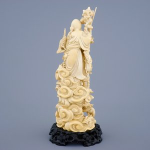 A Chinese carved ivory group of immortals on intricate wooden base, early 19th C. — 照片 3