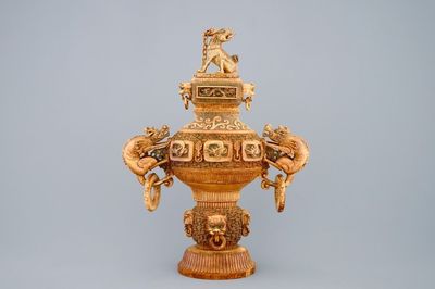 A Chinese carved ivory vase and cover, 19th C.