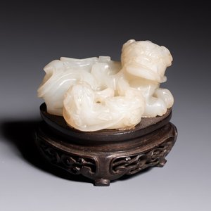 A Chinese carved jade 'Buddhist Lions' group, 19th C. — foto 1