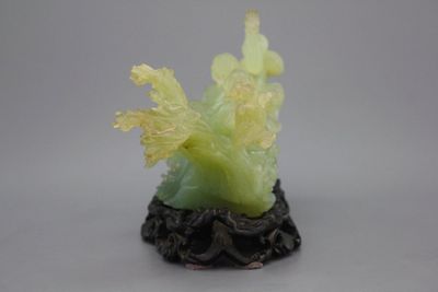 A Chinese carved jadeite group, Cultural Revolution, 20th C.