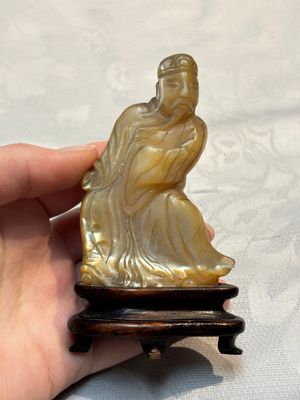 A Chinese carved mother-of-pearl figure of an official on wooden stand, 18/19th C. — photo 1