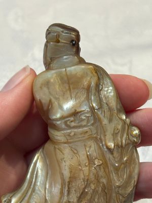 A Chinese carved mother-of-pearl figure of an official on wooden stand, 18/19th C. — photo 11