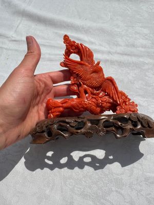 A Chinese carved red coral 'Birds and Flowers' group on a wooden stand, 19/20th C. — photo 1
