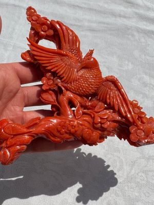 A Chinese carved red coral 'Birds and Flowers' group on a wooden stand, 19/20th C. — photo 4