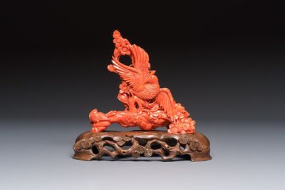 A Chinese carved red coral 'Birds and Flowers' group on a wooden stand, 19/20th C.