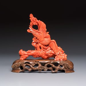 A Chinese carved red coral 'Birds and Flowers' group on a wooden stand, 19/20th C. — photo 1