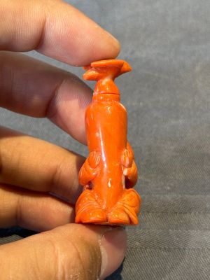 A Chinese carved red coral 'boy and vase' snuff bottle and stopper, 19th C. — photo 2
