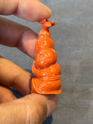 A Chinese carved red coral 'boy and vase' snuff bottle and stopper, 19th C. — photo 4