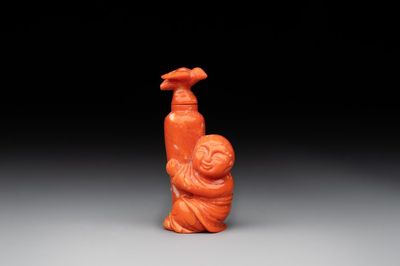 A Chinese carved red coral 'boy and vase' snuff bottle and stopper, 19th C.