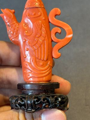 A Chinese carved red coral ewer and cover on wooden stand, 19th C. — photo 5