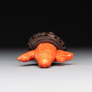 A Chinese carved red coral ewer and cover on wooden stand, 19th C. — photo 5