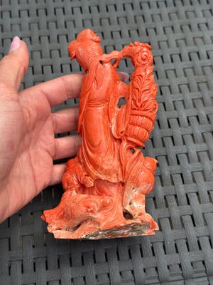 A Chinese carved red coral 'Goddess and Boys' group on a wooden stand, 19/20th C. — photo 5