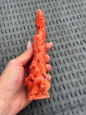 A Chinese carved red coral 'Goddess and Boys' group on a wooden stand, 19/20th C. — photo 6