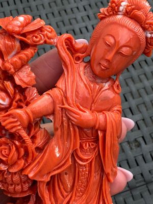 A Chinese carved red coral 'Goddess and Boys' group on a wooden stand, 19/20th C. — photo 9