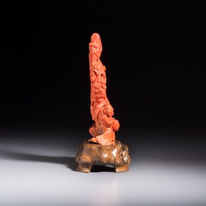 A Chinese carved red coral 'Goddess and Boys' group on a wooden stand, 19/20th C. — photo 4