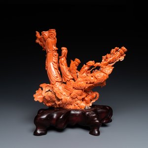A Chinese carved red coral 'Guanyin and servant' group, 19/20th C. — photo 3