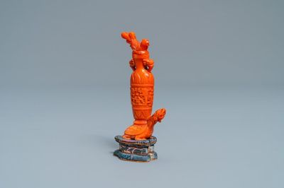 A Chinese carved red coral snuff bottle with a vase resting on a tortoise, Republic