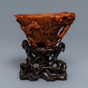 A Chinese carved rhinoceros horn 'libation cup', Ming/Qing — photo 1