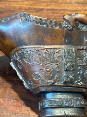 A Chinese carved rhinoceros horn 'libation cup' with chilong design, 17/18th C. — photo 8