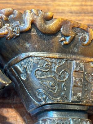 A Chinese carved rhinoceros horn 'libation cup' with chilong design, 17/18th C. — photo 10