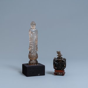 A Chinese carved rock crystal figure of Buddha and a small vase and cover, 19/20th C. — photo 1