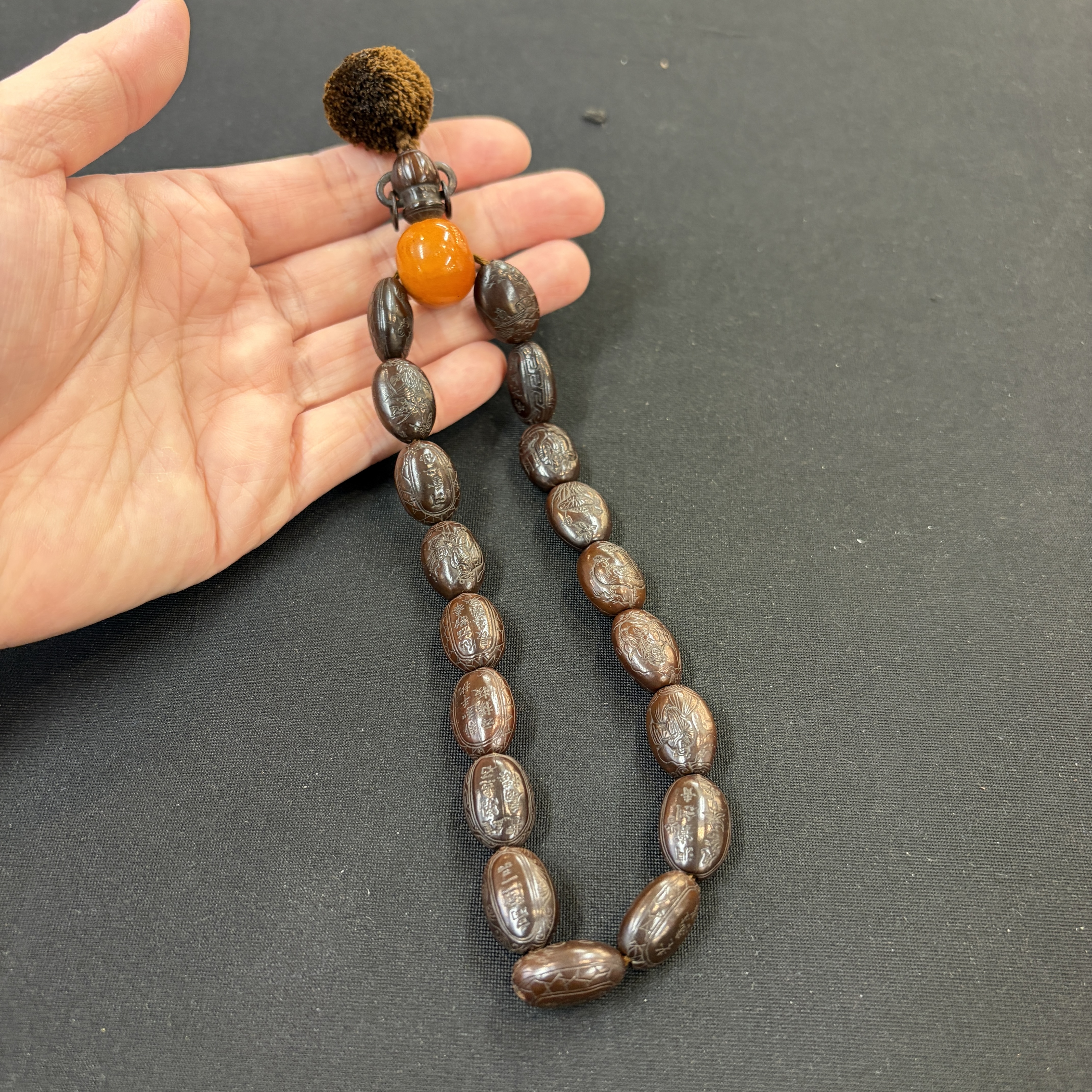 A Chinese carved seed prayer beads and amber beads — photo 10