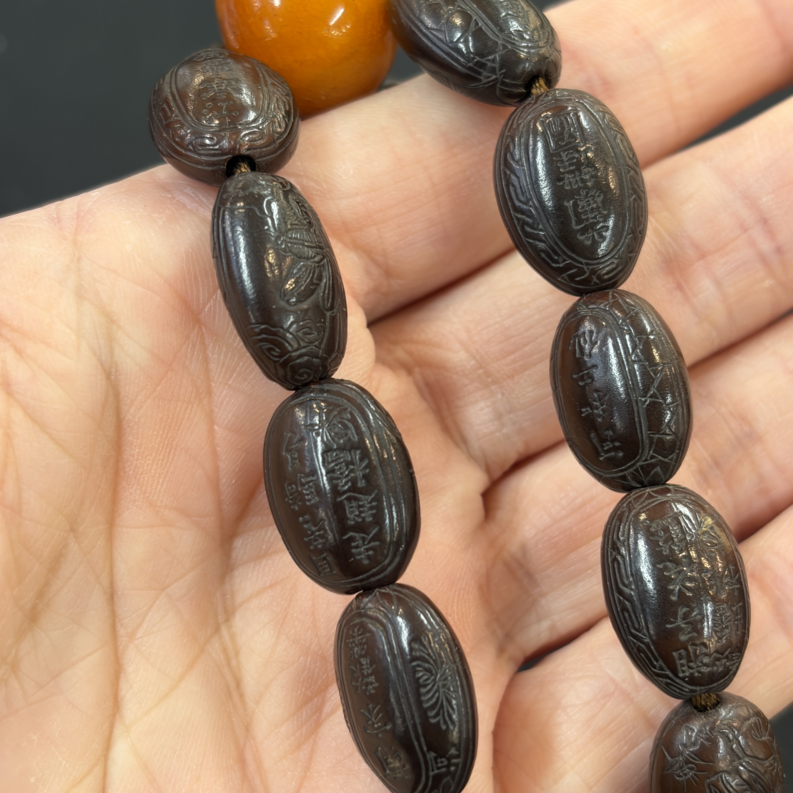 A Chinese carved seed prayer beads and amber beads — photo 13