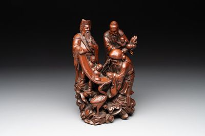 A Chinese carved wooden 'Fu Lu Shou' group, 19/20th C.