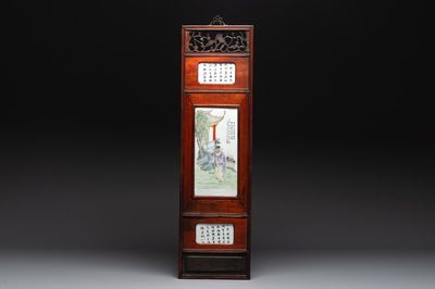A Chinese carved wooden panel with famille rose plaques in the style of Wang Qi 王琦, dated 1932