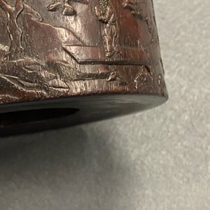 A Chinese carved zitan wood brush pot with a mountainous landscape, 17/18th C. — photo 42