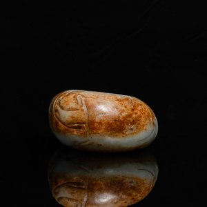 A Chinese celadon and russet jade boulder carving, Qing — photo 6