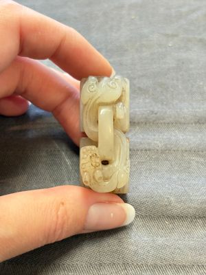 A Chinese celadon and russet jade 'chilong' seal, 18/19th C. — 照片 5