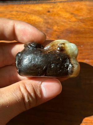 A Chinese celadon and russet jade mythical beast carving, Ming — photo 3