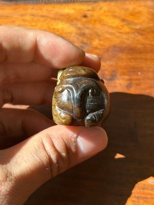 A Chinese celadon and russet jade mythical beast carving, Ming — photo 4